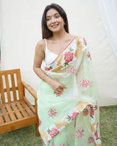 Opulent chikankari worked green rich look pure organza saree